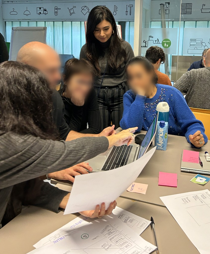 Team reviewing printed material during a workshop session
